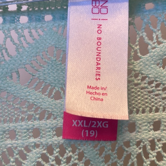 Woman’s mid sleeved , crochet back dressy turquoise pull on sweater. Like new. - Picture 4 of 4